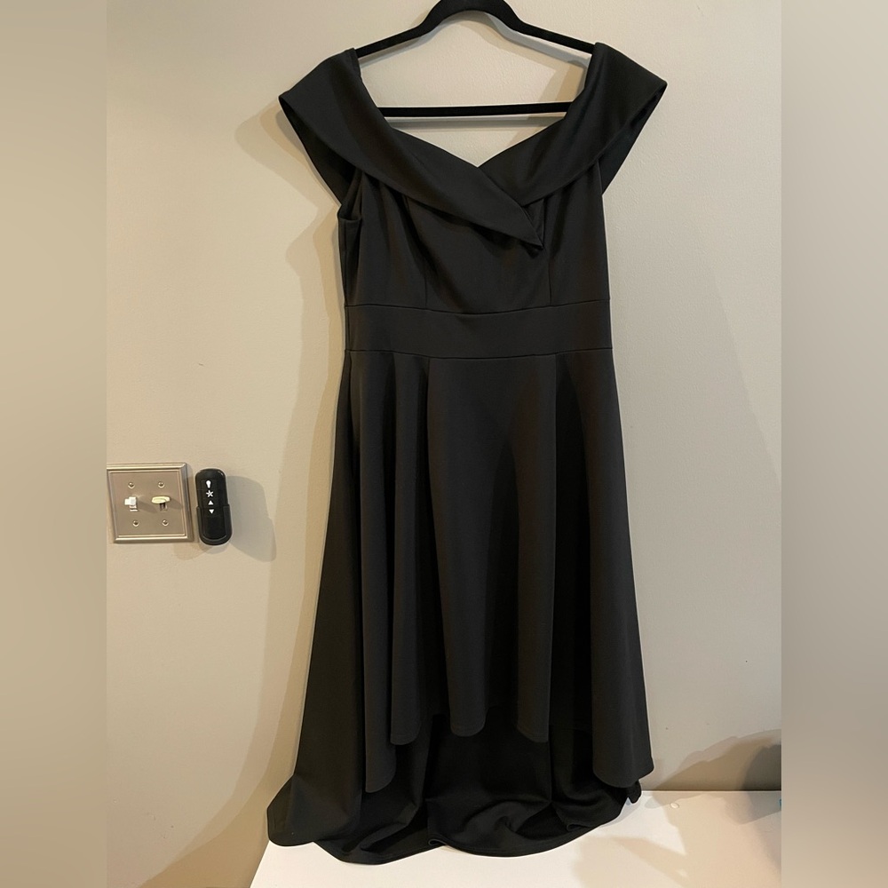 Off the shoulder cocktail style black dress. Size Large